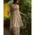 Stunning matka silk jamdani saree in beige with all over floral motifs