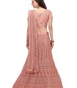 Peach embroidered net semi stitched lehenga