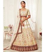 Off-white thread embroidery art silk semi stitched lehenga