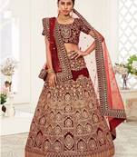 Red thread embroidery velvet semi stitched lehenga