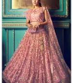 Purple embroidered net semi stitched lehenga