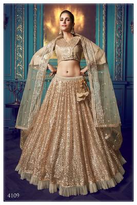 Beige embroidered net semi stitched lehenga 1