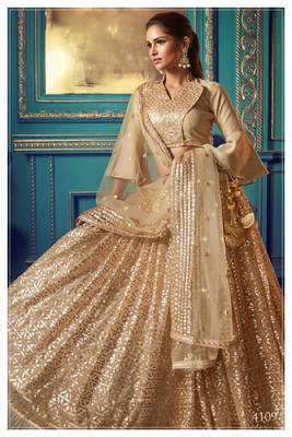 Beige embroidered net semi stitched lehenga 2