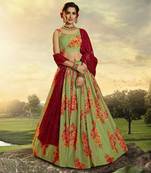 Green embroidered net semi stitched lehenga