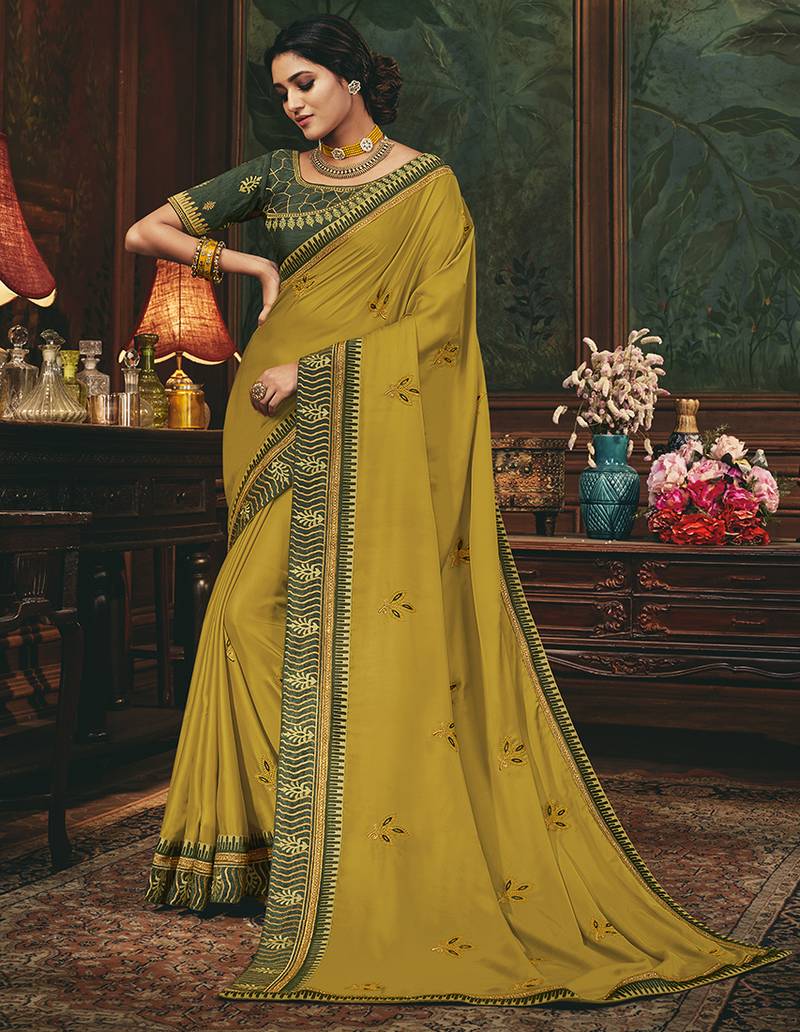 Mustard embroidered silk saree with blouse