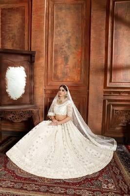 White embroidered net semi stitched lehenga 3