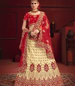 Beige thread embroidery satin semi stitched lehenga