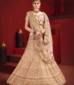 Beige thread embroidery satin semi stitched lehenga