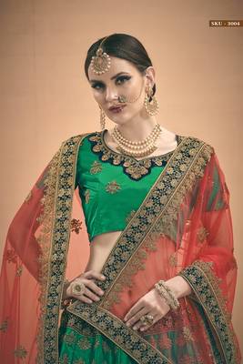 Green embroidered satin semi stitched lehenga 3