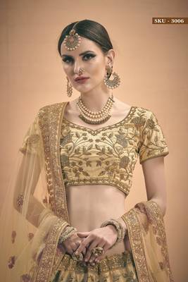 Beige embroidered satin semi stitched lehenga 3