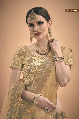 Beige embroidered satin semi stitched lehenga 4