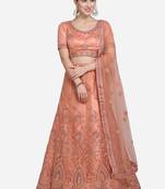 Peach embroidered net semi stitched lehenga