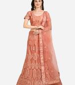 Peach embroidered net semi stitched lehenga