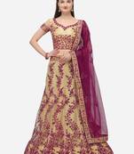 Beige embroidered net semi stitched lehenga