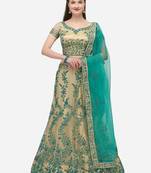 Beige embroidered net semi stitched lehenga
