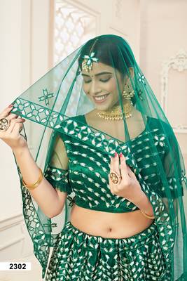 Green embroidered art silk semi stitched lehenga 3