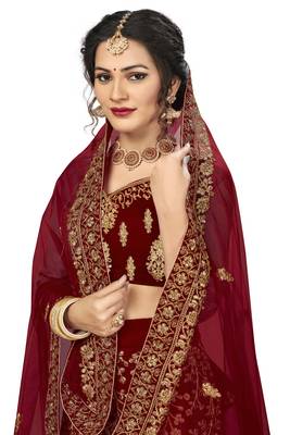 Maroon embroidered velvet semi stitched lehenga 2