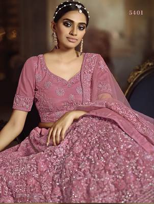 Pink embroidered net semi stitched lehenga 2