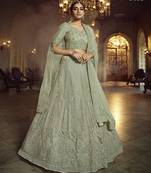 Green embroidered net semi stitched lehenga