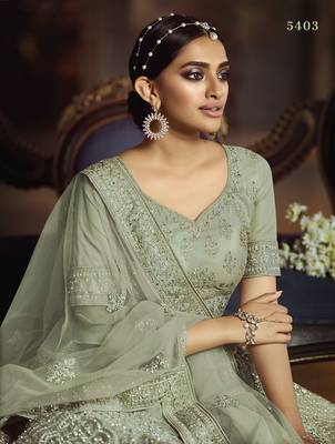 Green embroidered net semi stitched lehenga 2