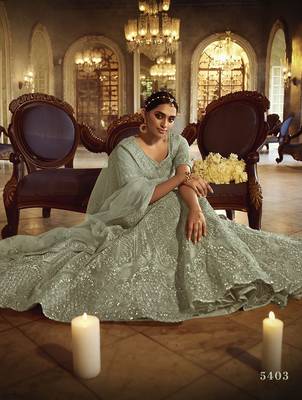 Green embroidered net semi stitched lehenga 4