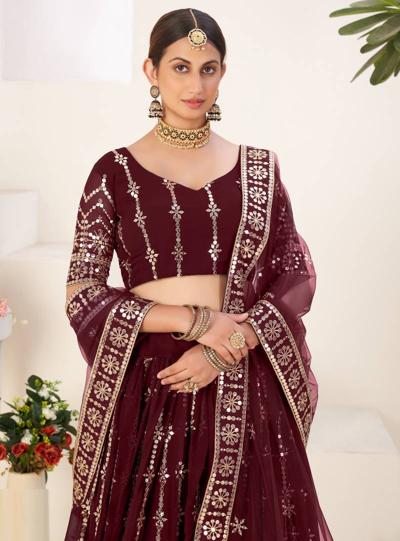 Mesmerizing Maroon embroidered georgette & net fabric lehenga choli for bride