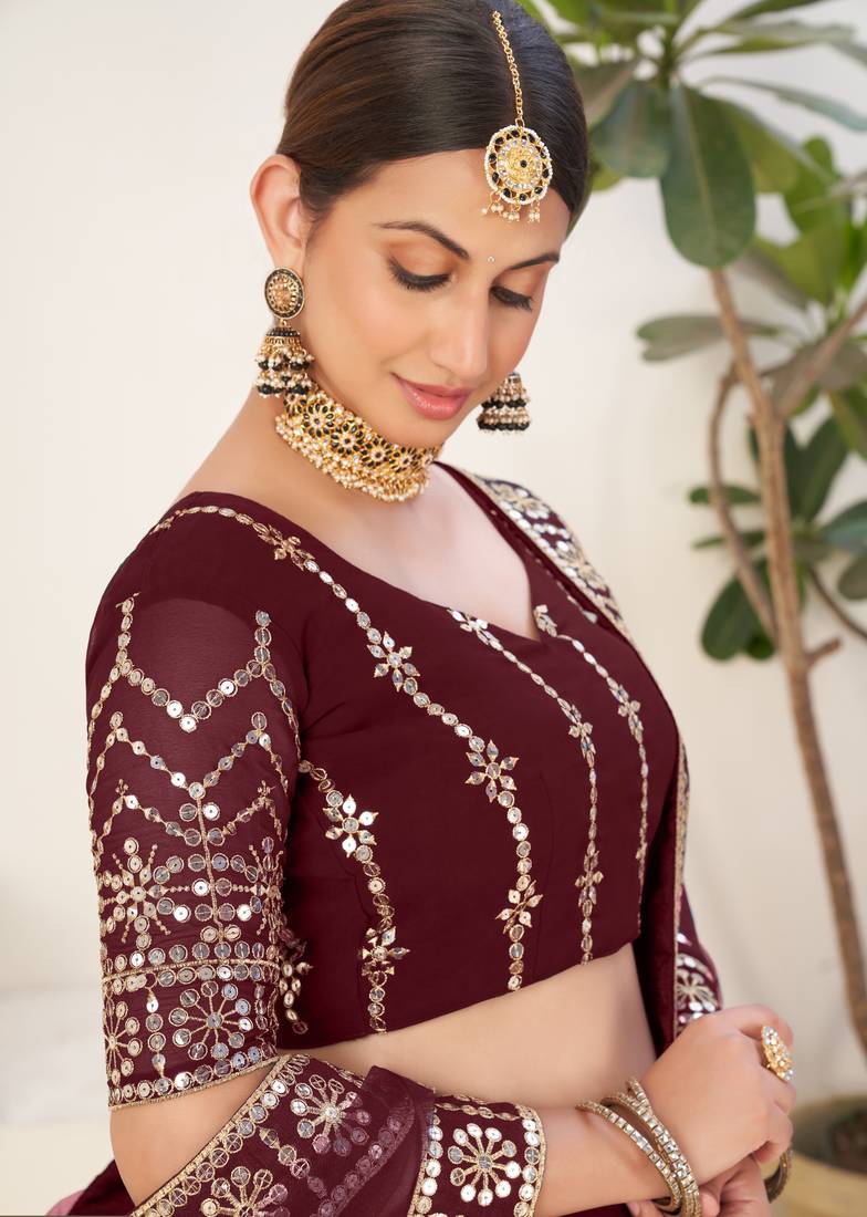 Mesmerizing Maroon embroidered georgette & net fabric lehenga choli for bride