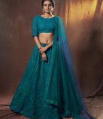 Dark-green thread embroidery net semi stitched bridal lehenga