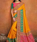 Mustard embroidered satin saree with blouse