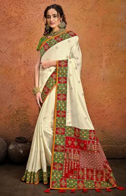Cream embroidered satin saree with blouse 1