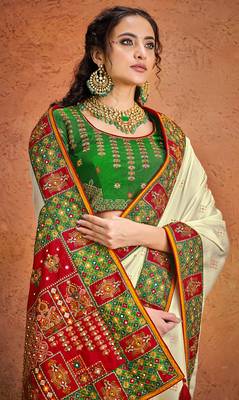 Cream embroidered satin saree with blouse 2