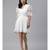 White Pleated Mini Skirt with Black Hearts