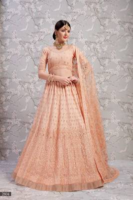 Peach embroidered net semi stitched lehenga 1