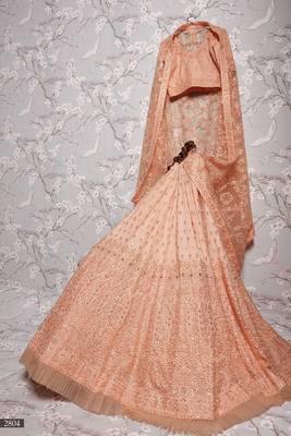 Peach embroidered net semi stitched lehenga 4
