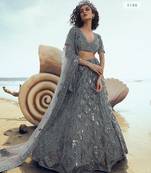 Grey embroidered net semi stitched lehenga