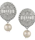 White pearl earrings