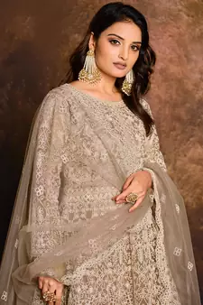 Beige embroidered net salwar kameez