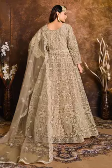 Beige embroidered net salwar kameez