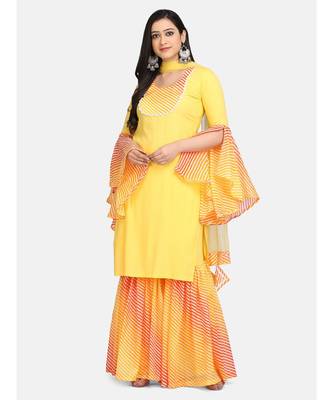 Yellow leheriya garara set duppta with fabric tassele 1