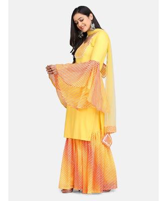 Yellow leheriya garara set duppta with fabric tassele 3