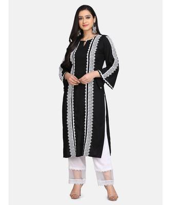 Black kurti all over laces with white pant with net border 1