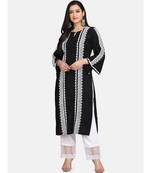 Black kurti all over laces with white pant with net border