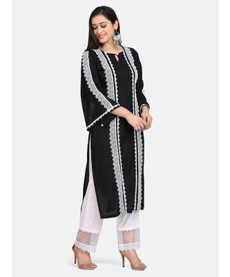 Black kurti all over laces with white pant with net border 5