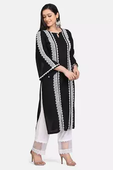 Black kurti all over laces with white pant with net border