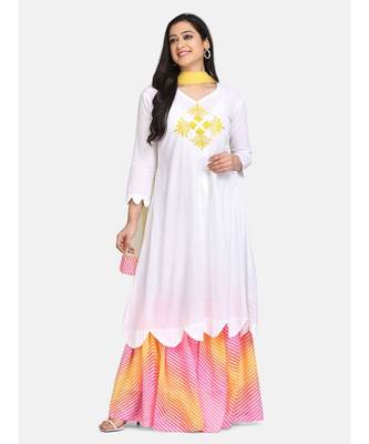 White kurti  yellow chikankari thread work leheriya garara with yellow  fabric tassele dupatta 1