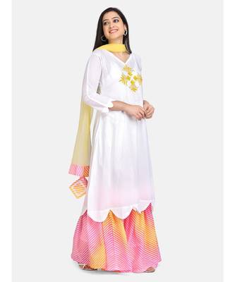 White kurti  yellow chikankari thread work leheriya garara with yellow  fabric tassele dupatta 4