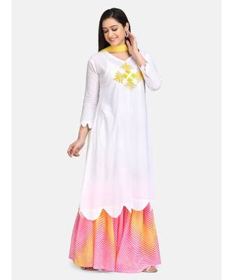 White kurti  yellow chikankari thread work leheriya garara with yellow  fabric tassele dupatta 5