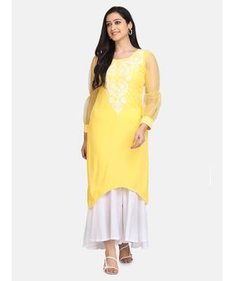 Yellow chikankari kurti with white bottom 1