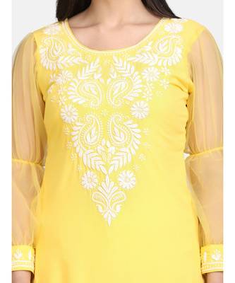 Yellow chikankari kurti with white bottom 6