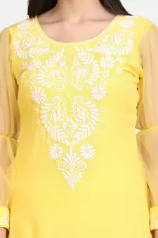 Yellow chikankari kurti with white bottom